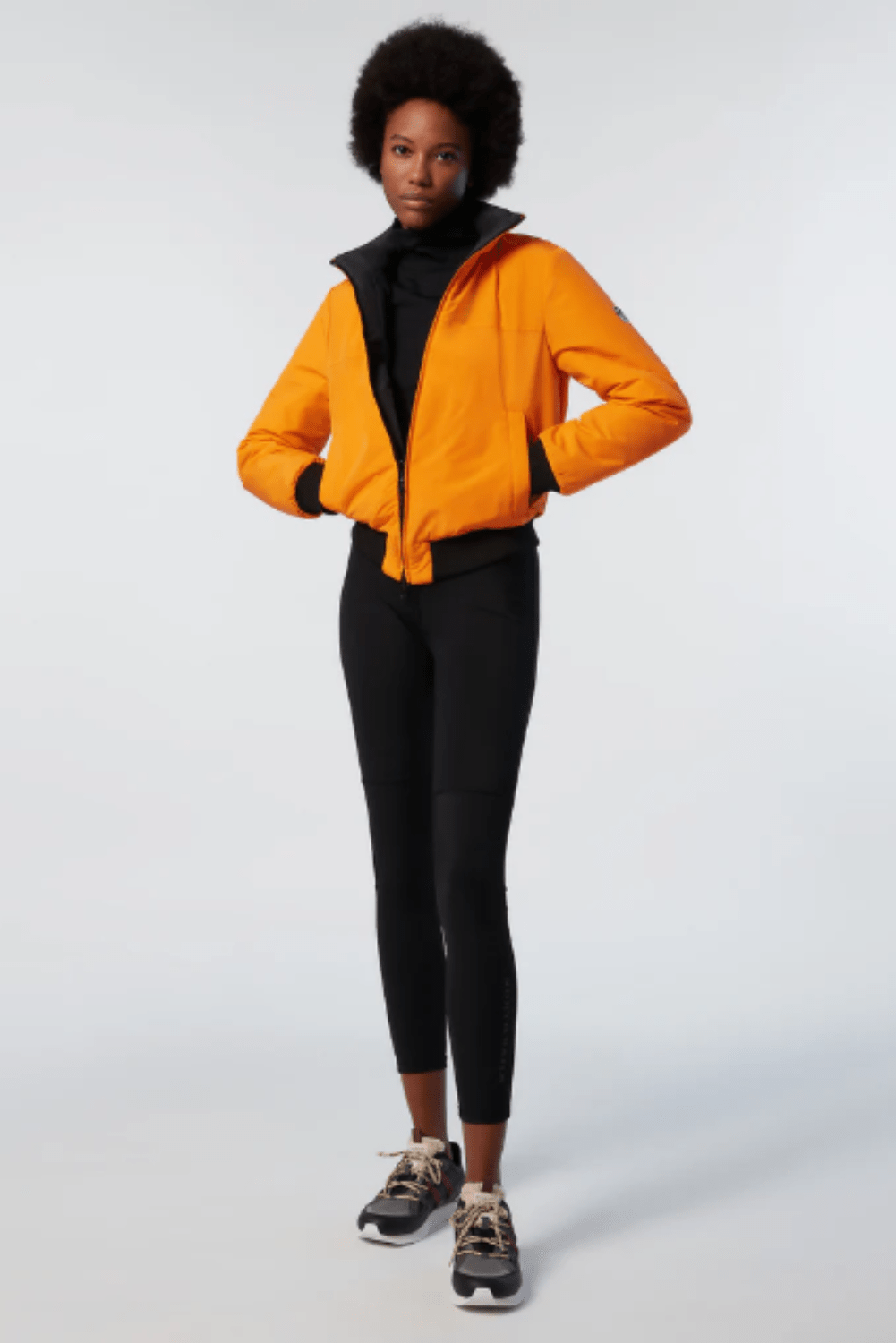 010024_veste_reversible_woman_interieur_orange&black_silhouette